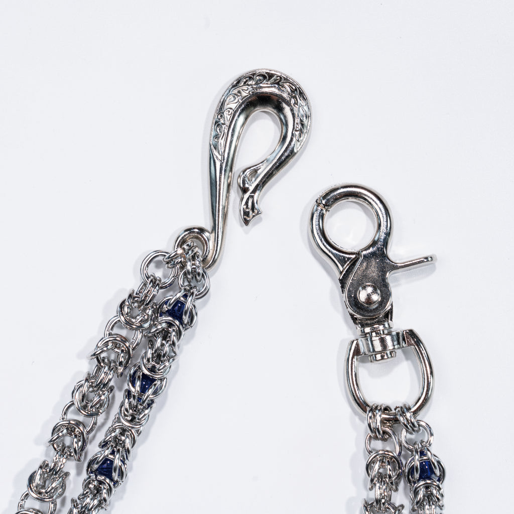Double-stranded purple-blue gemstone