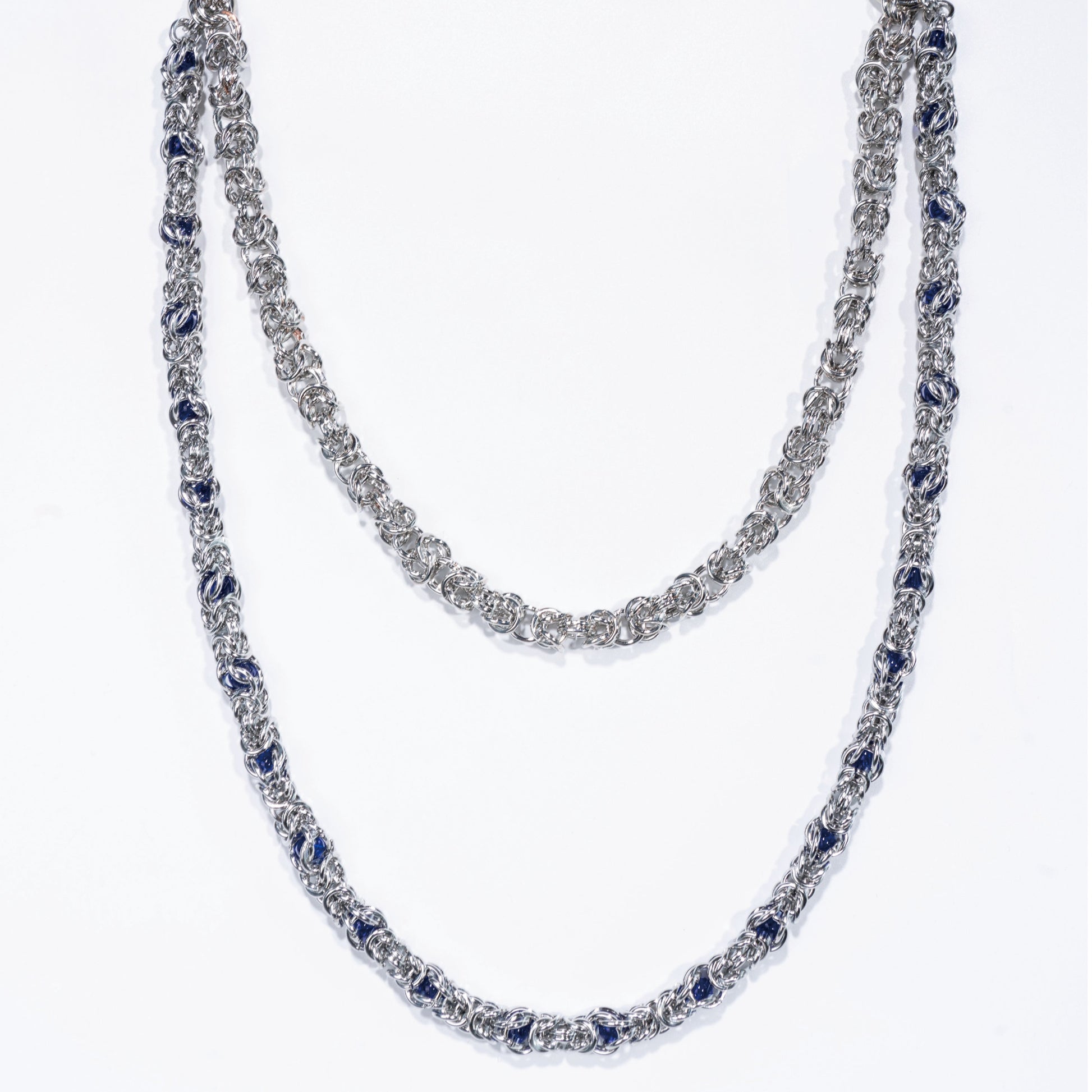 Double-stranded purple-blue gemstone