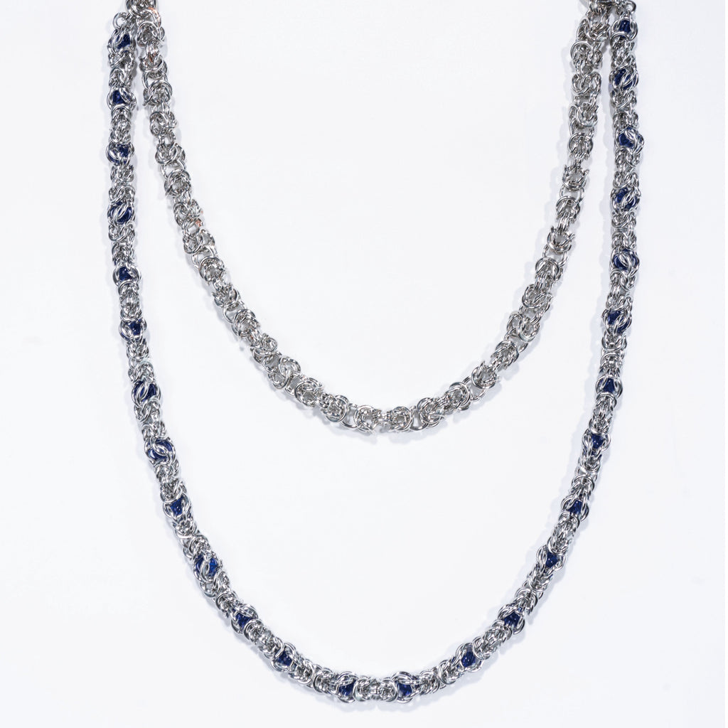 Double-stranded purple-blue gemstone